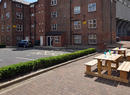 Picnic benches outside St Silas Flat 1